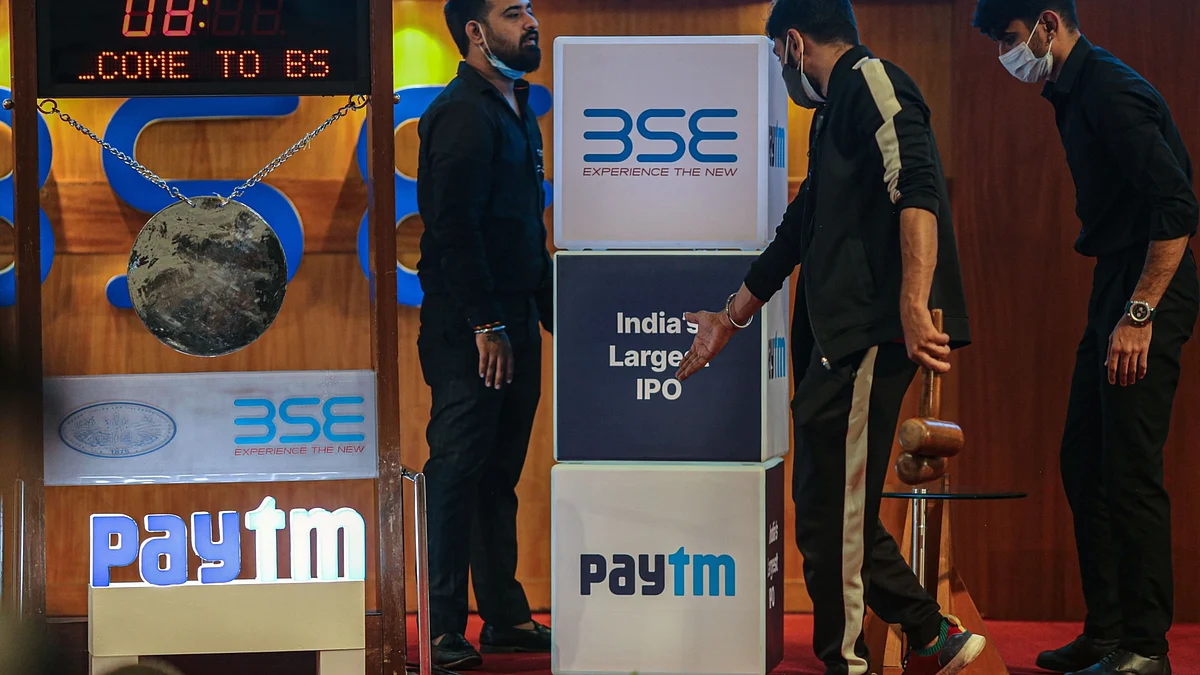 <div class="paragraphs"><p>Workers prepare the stage during the listing ceremony for the IPO of One97 Communications Ltd., operator of PayTM, at the Bombay Stock Exchange in Mumbai, India. (Photographer: Dhiraj Sing/Bloomberg)</p></div>