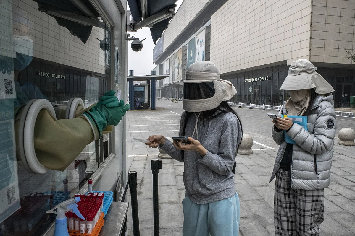 Beijing Tests Shoppers Buying Fever Drugs to Root Out Covid