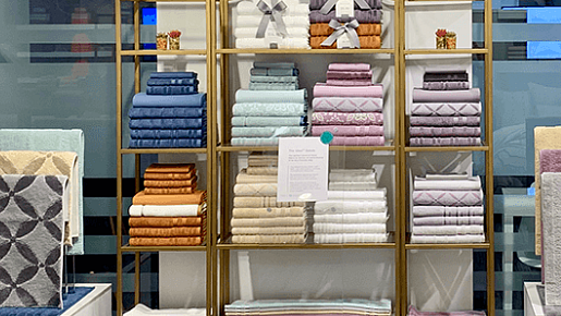 <div class="paragraphs"><p>Towels and bathrobes manufactured by Welspun India Ltd. displayed on a rack. (Source Company website)</p></div>
