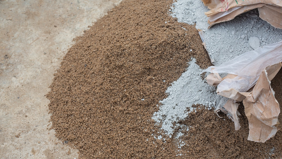 <div class="paragraphs"><p>Workers mixing cement, stone, sand for construction. (Source: freepik)</p></div>