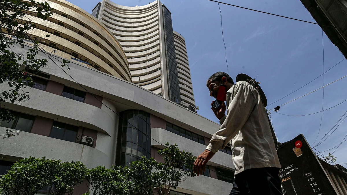 <div class="paragraphs"><p>A pedestrian walks past the Bombay Stock Exchange (BSE) building in Mumbai, India.</p></div>