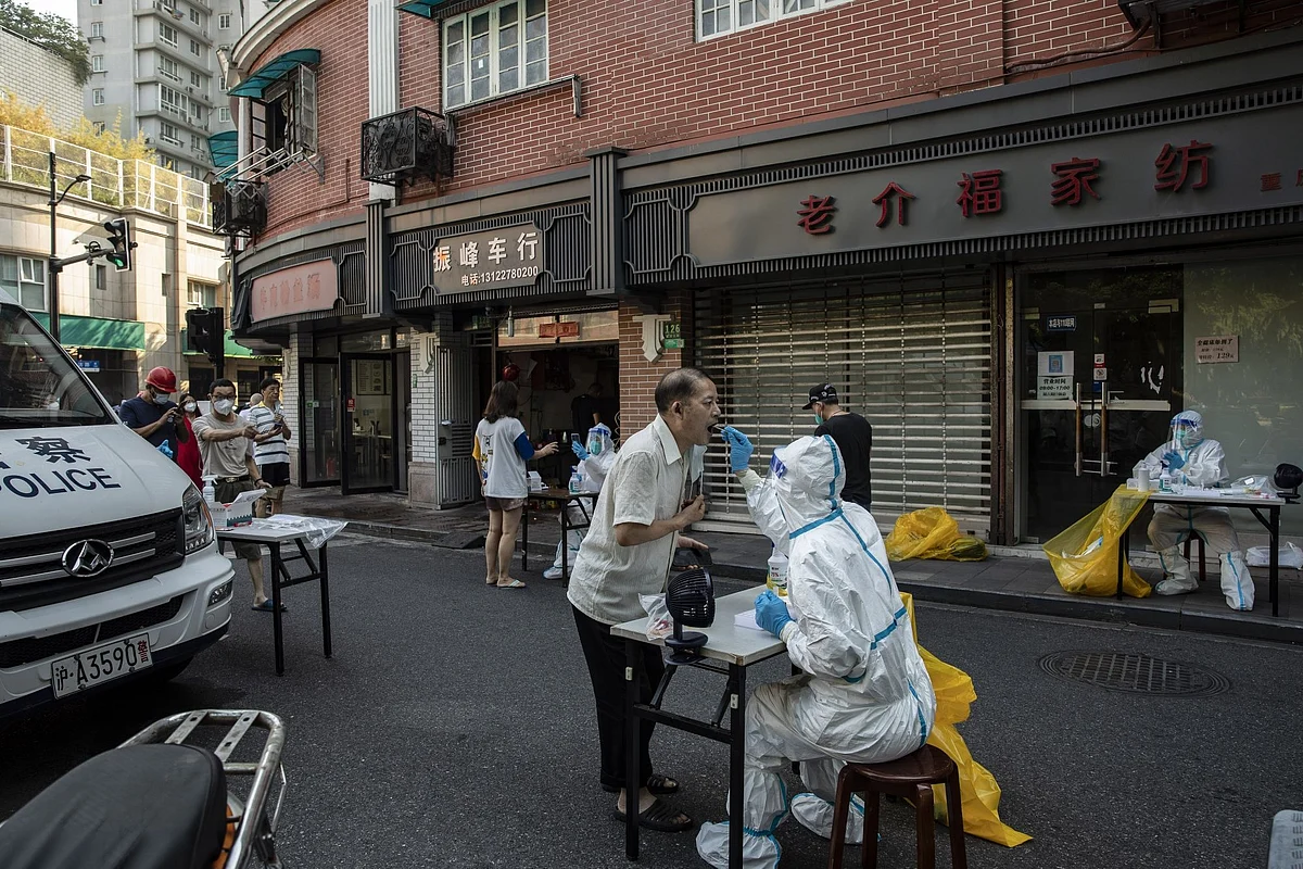 Residents are tested for Covid-19 in Shanghai, on July 10. Photographer: Qilai Shen/Bloomberg