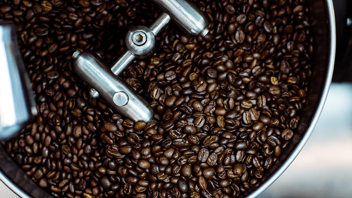 <div class="paragraphs"><p>Coffee beans are roasted inside a coffee roaster. (Photo: Gregory-Hayes/ Unsplash)</p></div>