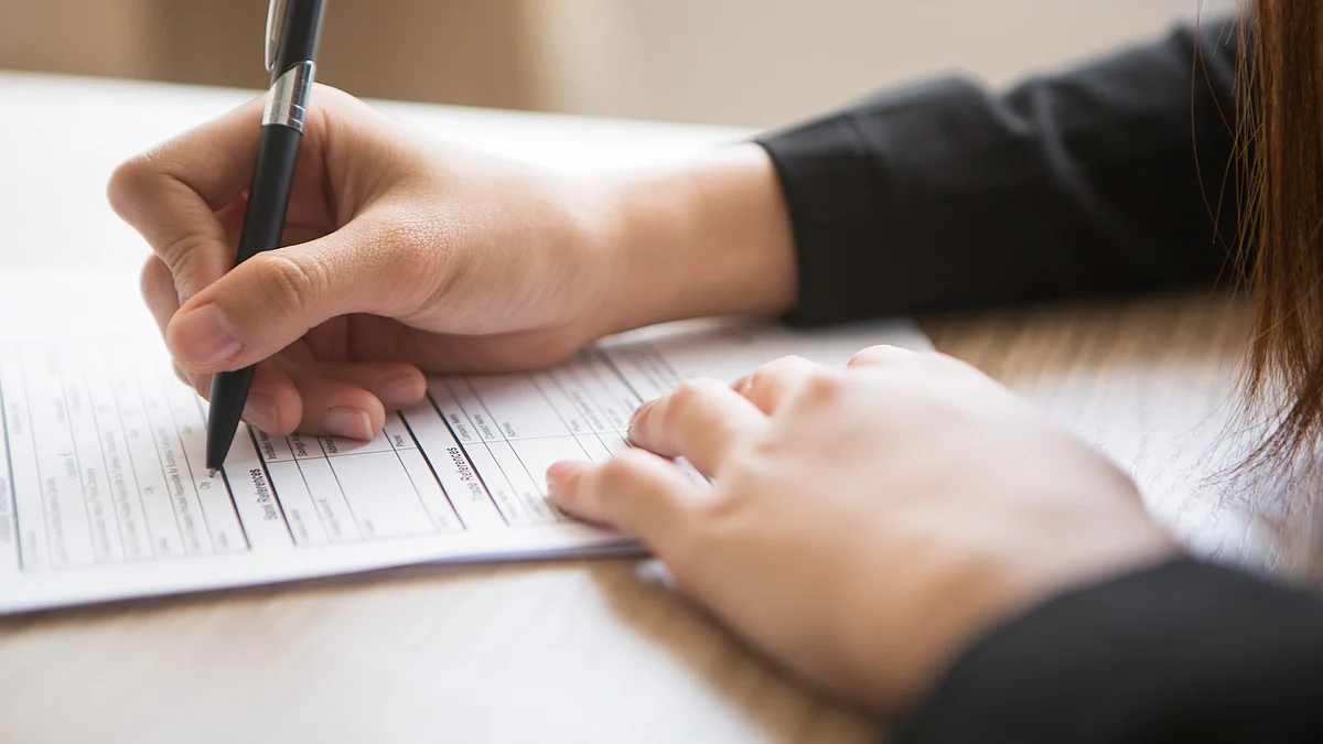 <div class="paragraphs"><p>Woman filling an application form. (Source: freepik)</p></div>