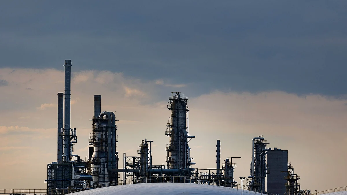 Storage tanks at the TotalEnergies SE Leuna oil refinery in Leuna, Germany, on Tuesday, June 7, 2022. TotalEnergies' 240,000 barrels per day Leuna refinery is set to cease importing Russian crude oil via the Druzhba pipeline some time later this year. Photographer: Krisztian Bocsi/Bloomberg