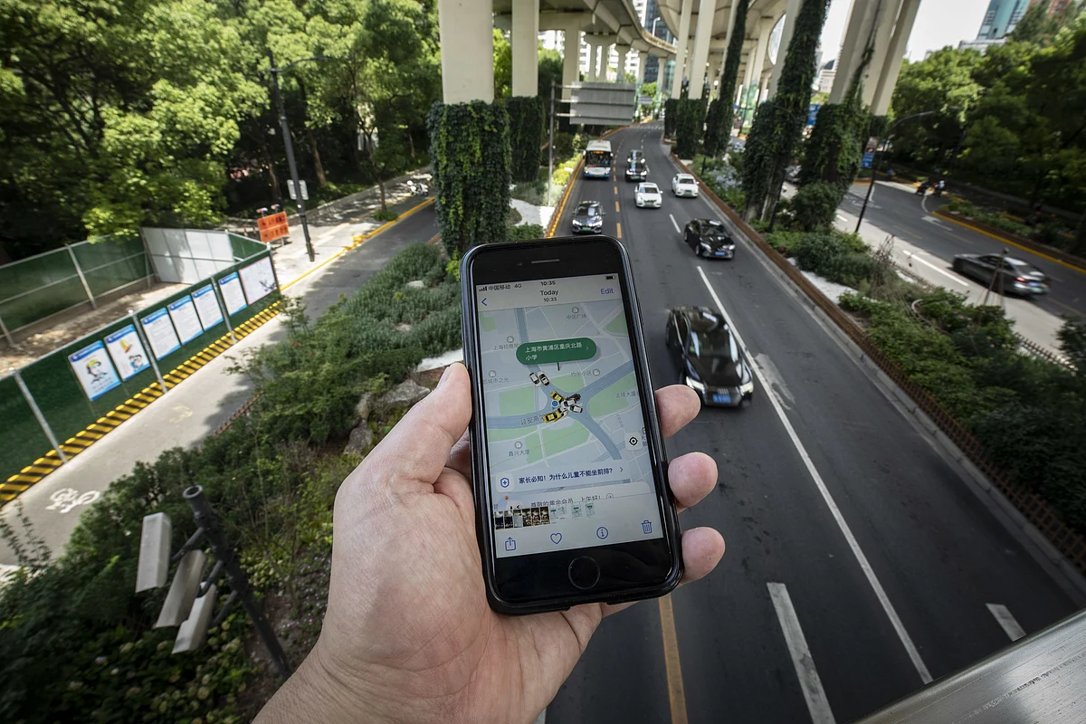 The Didi ride-hailing app on a smartphone arranged in Shanghai, China, on Monday, June 27, 2022. Didi's ordeal since it debuted in New York despite regulators’ objections has become one of the clearest object lessons in the dangers of doing business in China. Photographer: Qilai Shen/Bloomberg
