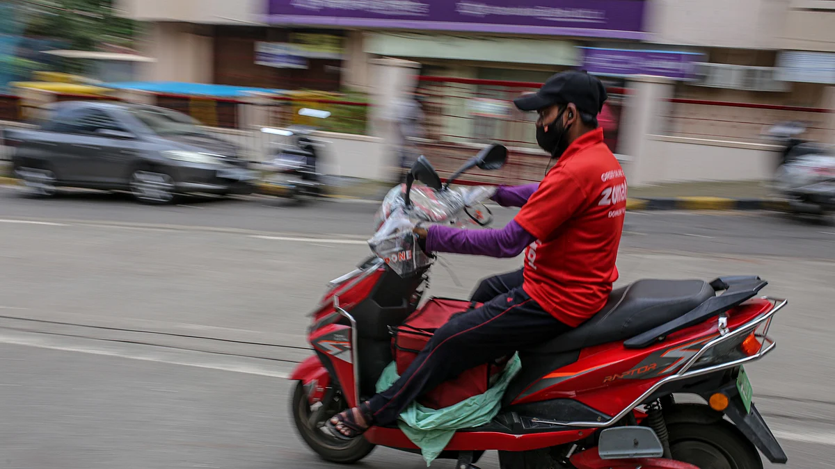 <div class="paragraphs"><p>A Zomato delivery rider on a motorcycle in Mumbai. </p></div>