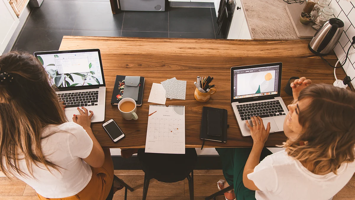 <div class="paragraphs"><p>Staff working on laptop at their workstation in an office. (Photo: Mark Sivewright /Unsplash)</p></div>