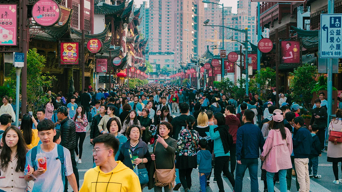 <div class="paragraphs"><p>People walking down the street in China. (Photo: Javier-Quiroga/ Unsplash)</p></div>