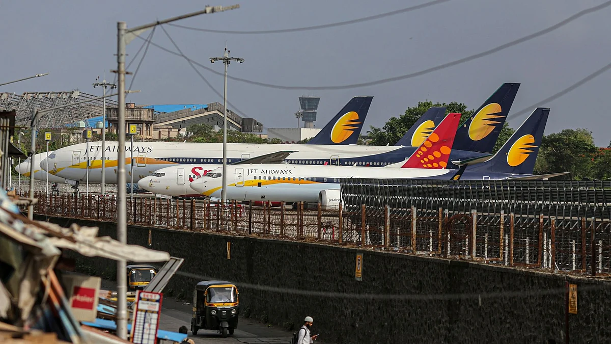 <div class="paragraphs"><p>Jet Airways aircraft at Mumbai airport on May 26, 2021. (Photographer: Dhiraj Singh/Bloomberg)</p></div>