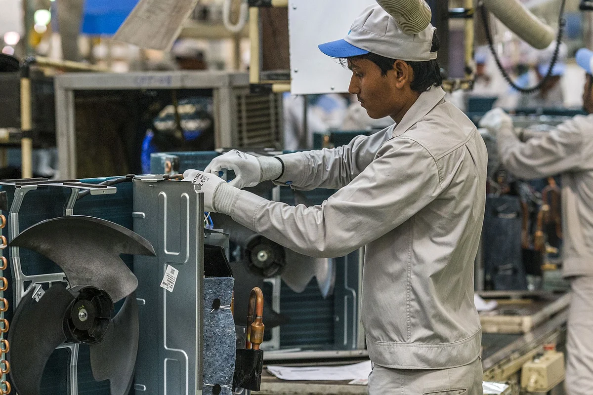 <div class="paragraphs"><p>An employee works on a split AC at a Daikin factory in Rajasthan.</p></div>