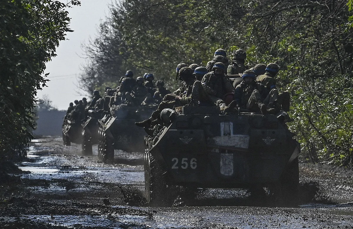Ukrainian soldiers ride a top of infantry fighting vehicles in Novoselivka, on September 17, 2022, as the Russia-Ukraine war enters its 206th day. Photographer: Juan Barreto/AFP/Getty Images