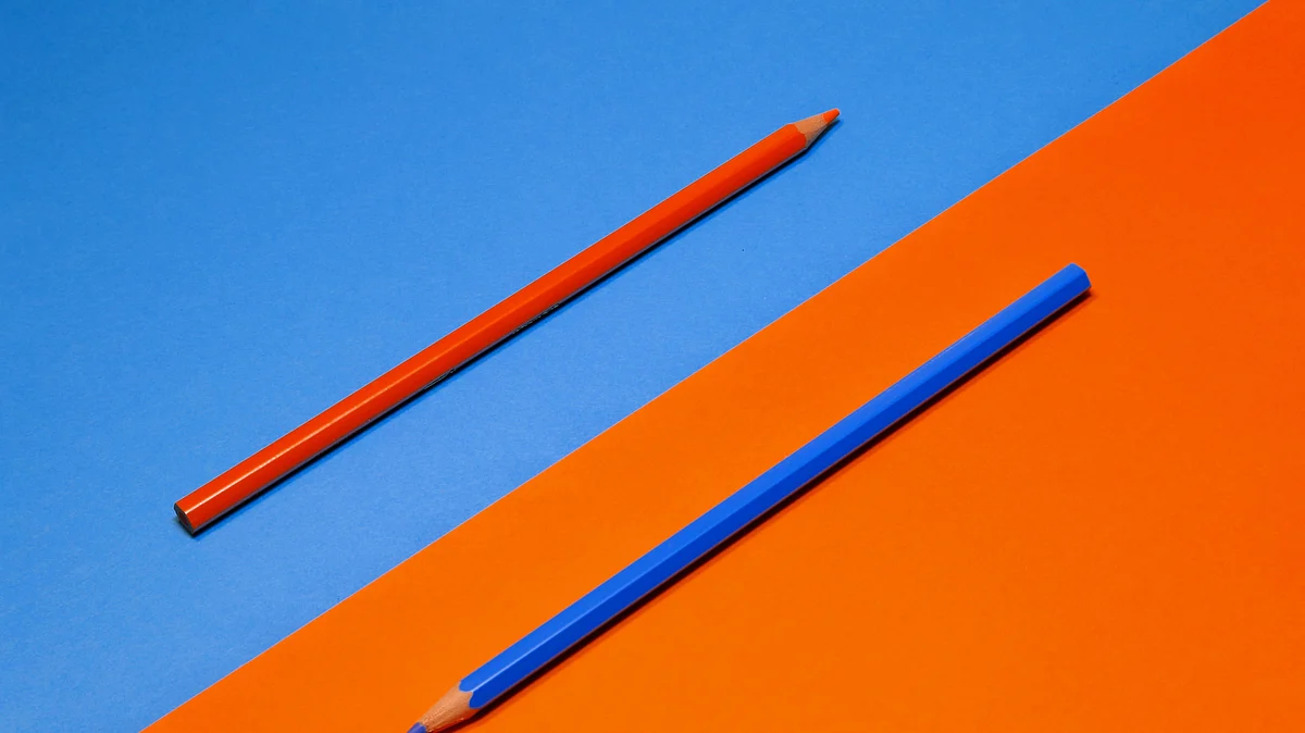 <div class="paragraphs"><p>Two coloured pencils placed in opposite direction. (Photo: Alice Yamamura/Unsplash)</p></div>