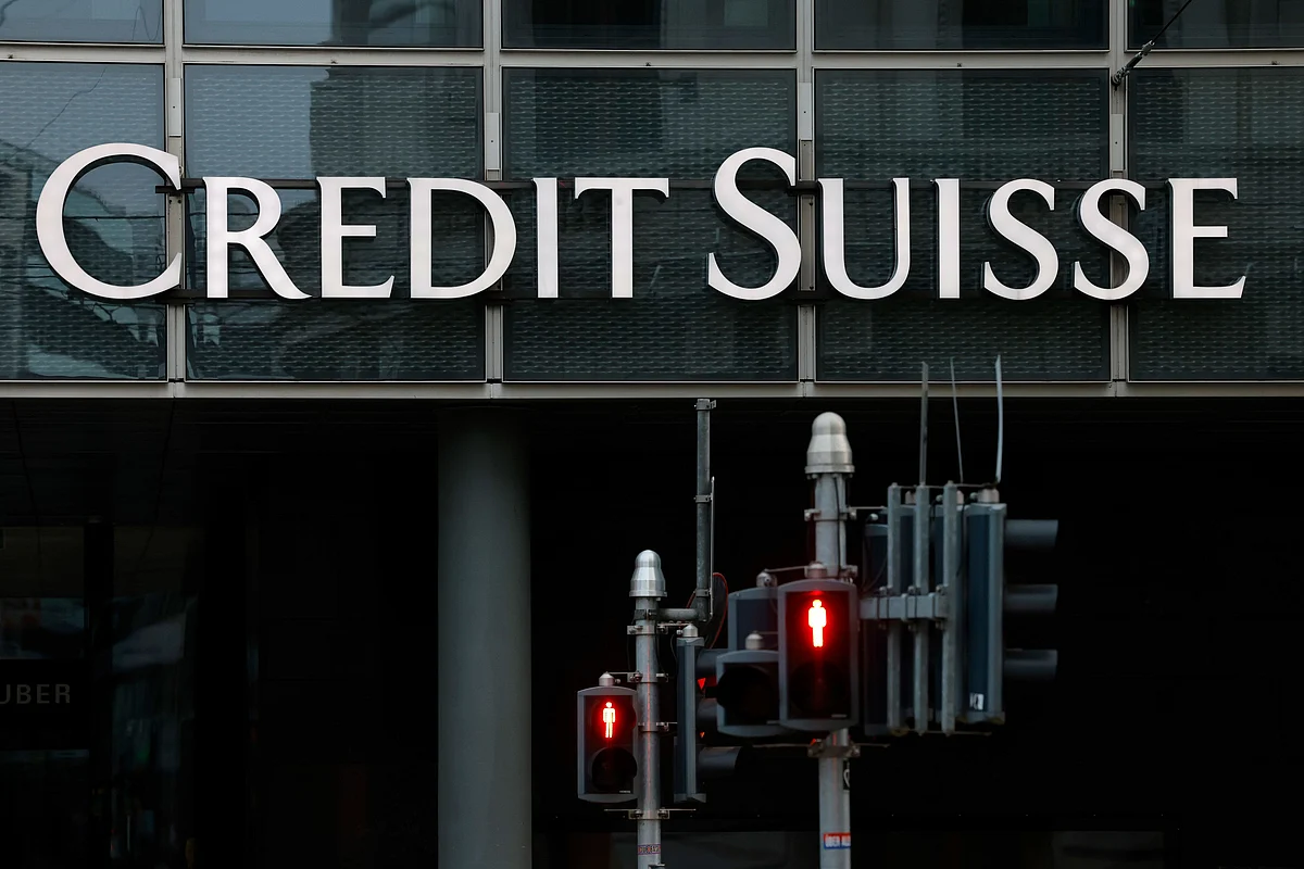 Red pedestrian crossing signs outside a Credit Suisse Group AG bank branch in Basel, Switzerland, on Tuesday, Oct. 25, 2022. Credit Suisse will present its third quarter earnings and strategy review on Oct. 27. Photographer: Stefan Wermuth/Bloomberg