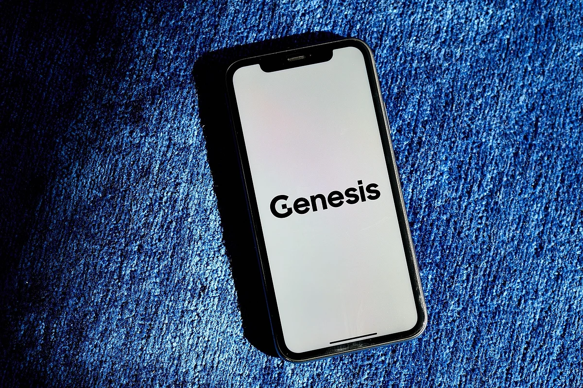 The Genesis logo on a smartphone arranged in the Brooklyn borough of New York, US, on Thursday, Nov. 17, 2022. Reverberations from the collapse of Sam Bankman-Fried’s empire continue to spread through financial markets, threatening the future of crypto lenders like BlockFi Inc. and Voyager Digital Ltd. Photographer: Gabby Jones/Bloomberg