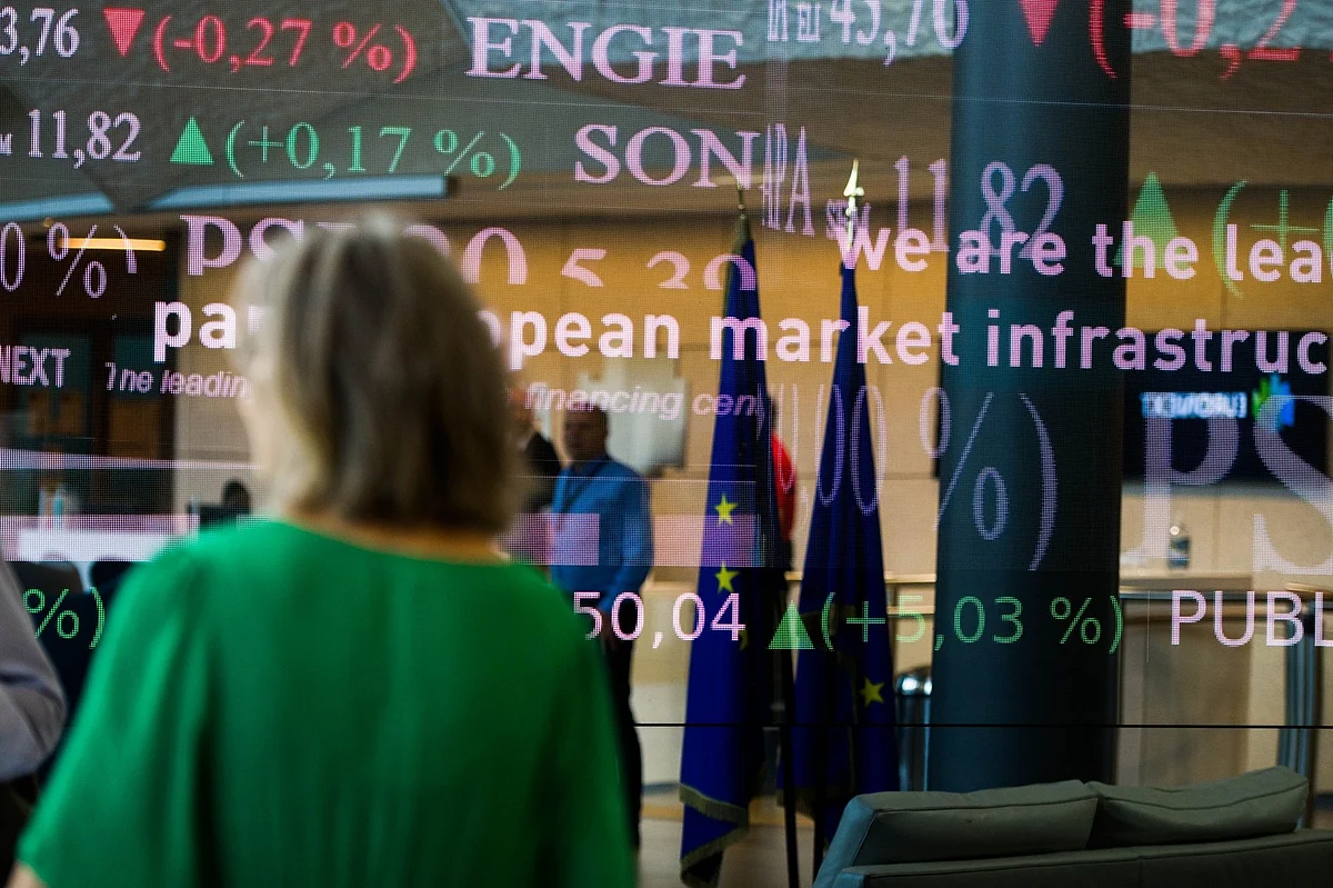 Stock price information displayed in the lobby of the Euronext NV stock exchange in Paris, France, on Thursday, June 16, 2022. The CAC 40 Index has outperformed other major European benchmarks during Emmanuel Macrons presidency, but an upset at the upcoming parliamentary election could dent the sentiment toward French stocks. Photographer: Nathan Laine/Bloomberg