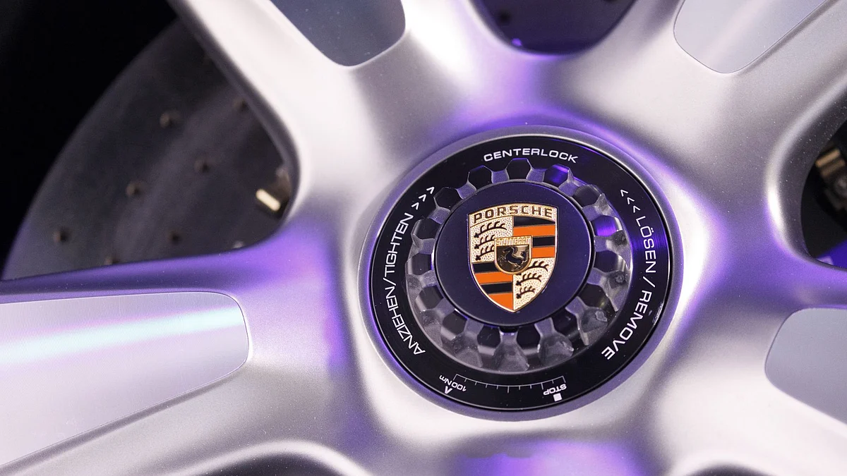 The Porsche AG logo is seen on the wheel of a 911 Speedster Concept automobile as the luxury automaker celebrates its 70th anniversary in Stuttgart, Germany, on Friday, June 8, 2018. Photographer: Alex Kraus/Bloomberg