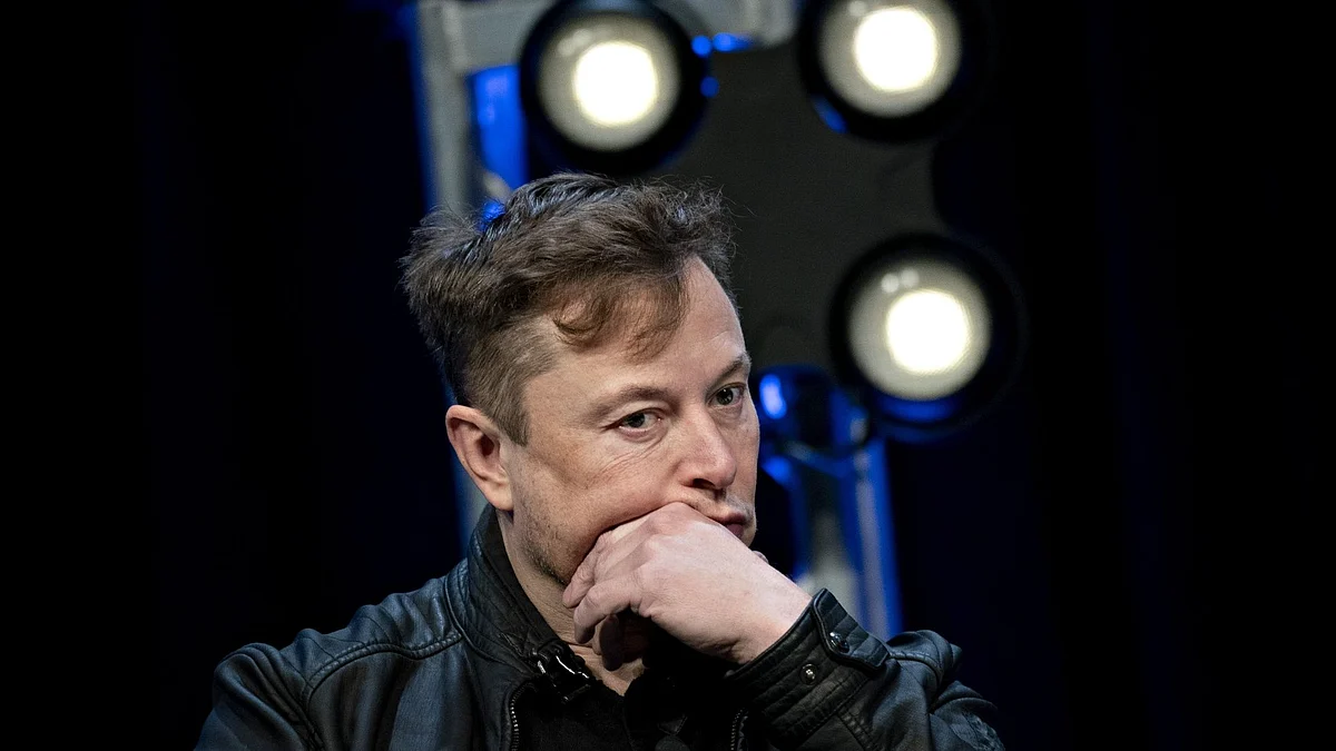 Elon Musk, founder of SpaceX and chief executive officer of Tesla Inc., listens during a discussion at the Satellite 2020 Conference in Washington, D.C., U.S., on Monday, March 9, 2020. The event comprises important topics facing both satellite industry and end-users, and brings together a diverse group of thought leaders to share their knowledge.