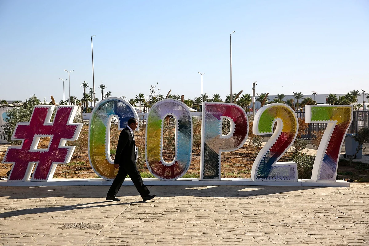 A COP27 logo sign in the grounds of the Sharm El-Sheikh International Convention Centre in Egypt.