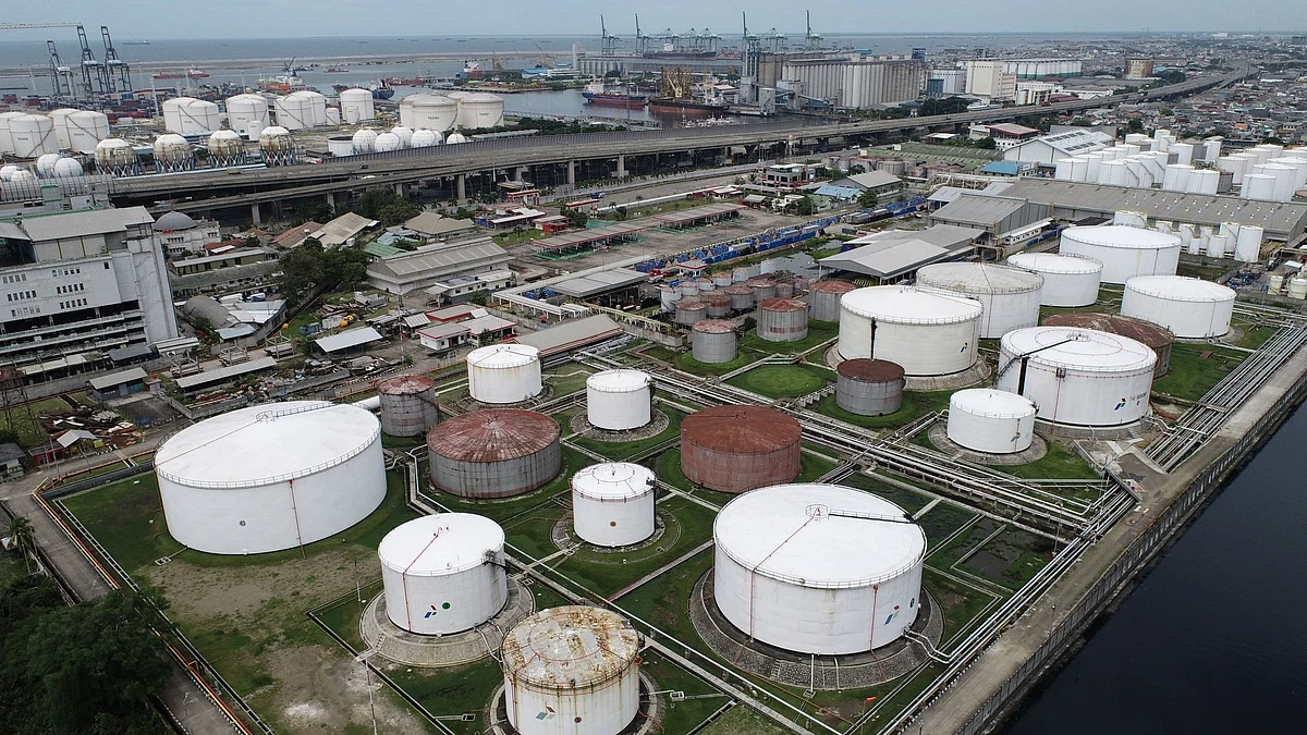 Fuel storage tanks at a PT Pertamina facility at Tanjung Priok Port in Jakarta, Indonesia, on Thursday, Feb. 24, 2022. Oil surged above $100 a barrel for the first time since 2014 as Russia attacked sites across Ukraine, triggering fears of a disruption to energy exports at a time of already tight supplies. Photographer: Dimas Ardian/Bloomberg