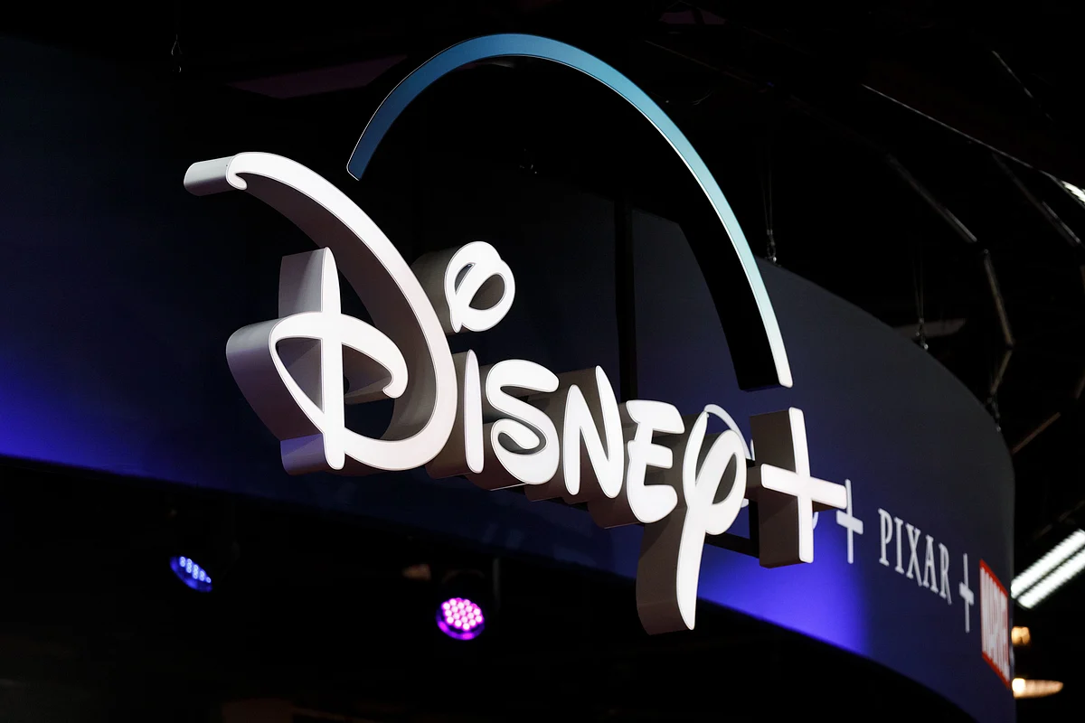 Signage for the Disney+ streaming service is displayed during the D23 Expo 2019 in Anaheim, California, U.S., on Friday, Aug. 23, 2019. Walt Disney Co. is turning the D23 Expo, the biennial fan conclave, into a big push for its new streaming services. Photographer: Patrick T. Fallon/Bloomberg
