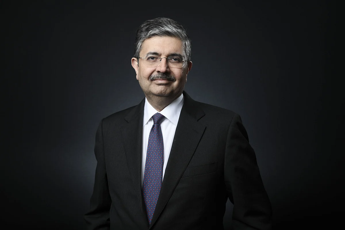 Uday Kotak, billionaire and chairman of Kotak Mahindra Bank Ltd., poses for a photograph following a Bloomberg Television interview on the opening day of the World Economic Forum (WEF) in Davos, Switzerland, on Tuesday, Jan. 23, 2018. World leaders, influential executives, bankers and policy makers attend the 48th annual meeting of the World Economic Forum in Davos from Jan. 23 - 26.