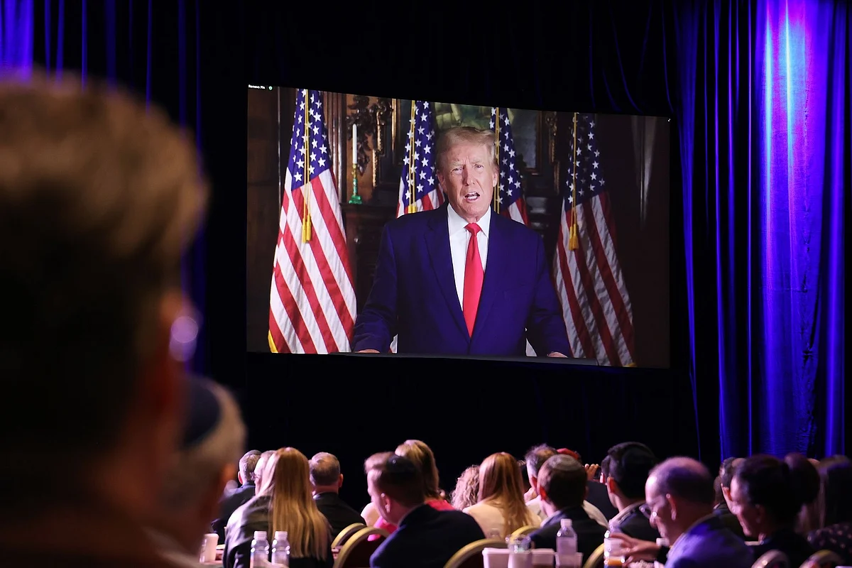 Former US President Donald Trump speaks remotely during the Republican Jewish Coalition (RJC) Annual Leadership Meeting in Las Vegas, Nevada, US, on Saturday, Nov. 19, 2022. Democrats defied political forecasts and historical trends to keep control of the Senate in a win for President Joe Biden, as voters rejected a handful of candidates backed by former President Donald Trump.