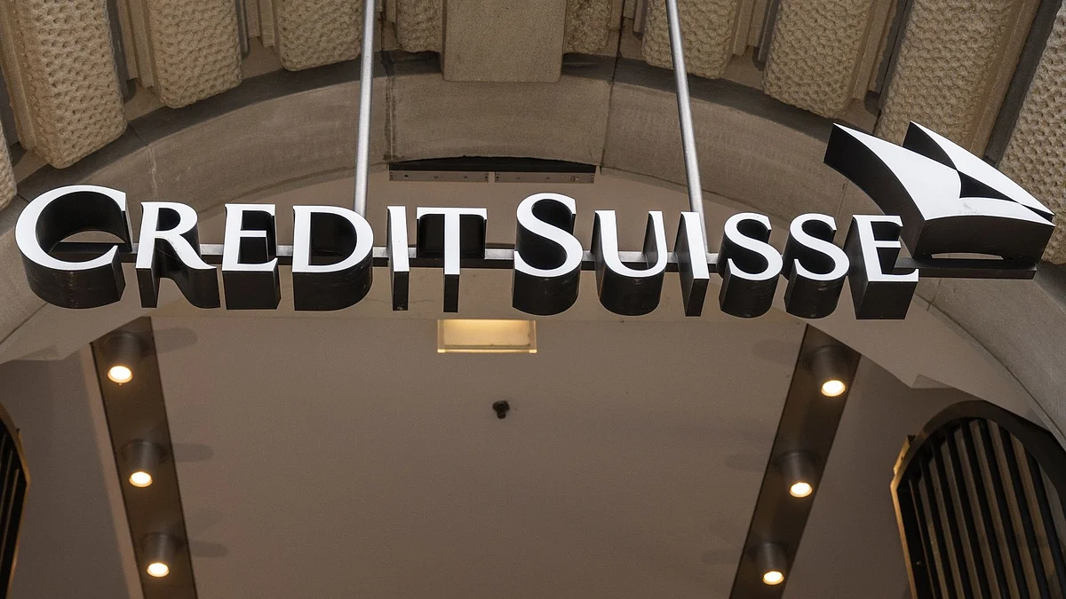 Signage hangs over the entrance of a Credit Suisse Group AG branch in Zurich, Switzerland, on Sunday, Sept. 25, 2022. Inflation in Switzerland has more than doubled since the start of the year and the State Secretariat for Economic Affairs expects it to come in at a three-decade-high of 3% for 2022. Photographer: Pascal Mora/Bloomberg