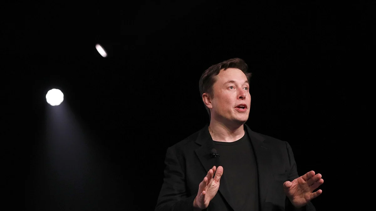 Elon Musk, co-founder and chief executive officer of Tesla Inc., speaks during an unveiling event for the Tesla Model Y crossover electric vehicle in Hawthorne, California, U.S., on Friday, March 15, 2019. Musk said the cheaper electric crossover sports utility vehicle (SUV) will be available from the spring of 2021. The vehicle's price will start at $39,000, a longer-range version will cost $47,000.