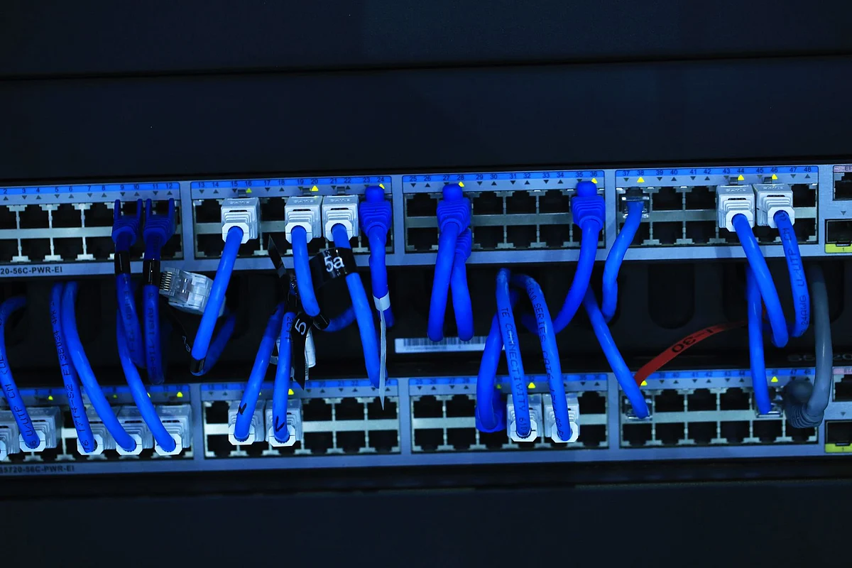 Blue cables connect computer server units at the CeBIT 2017 tech fair in Hannover, Germany, on Tuesday, March 21, 2017. Leading edge technologies in the digital world are showcased in this annual event which runs March 20 - 24. Photographer: Krisztian Bocsi/Bloomberg