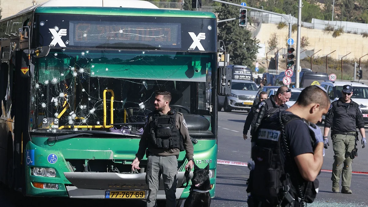 Poliice officers at the scene of an explosion in Jerusalem, on Nov. 23. Photographer: Menahem Kahana/AFP/Getty Images