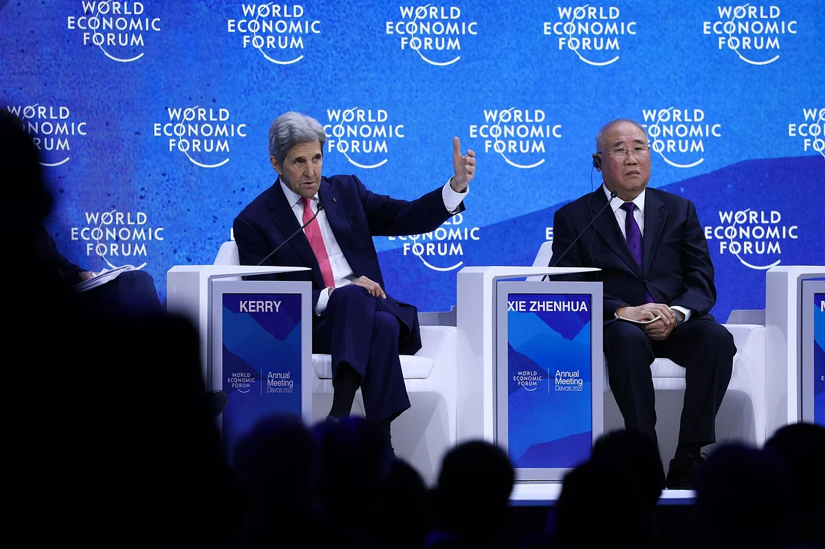 John Kerry, U.S. special presidential envoy for climate, left, and Xie Zhenhua, China's special envoy for climate change May 2022.