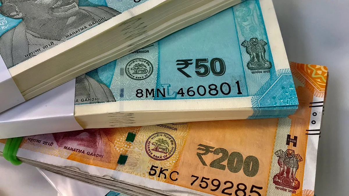 <div class="paragraphs"><p>Close view of Indian banknotes, rupees arranged for photograph. (Photo: Vijay Sartape/ Source: BQ Prime)</p></div>