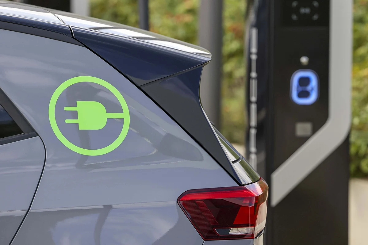 A Volkswagen AG ID.3 electric vehicle (EV) charges outside at the Porsche SE showroom in Dortmund, Germany, on Wednesday, Sept. 7 2022. VW is pushing ahead with its plan to list a minority stake in the Porsche sports-car maker despite gyrating markets, paving the way for what could be one of Europe's biggest initial public offerings.
