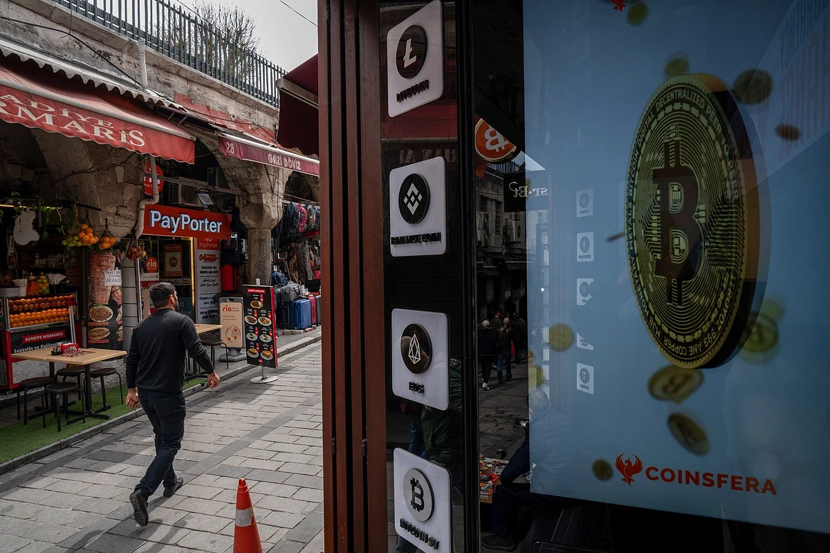 <div class="paragraphs"><p>Cryptocurrency logo signs outside a crypto exchange kiosk in Istanbul, Turkey.</p></div>