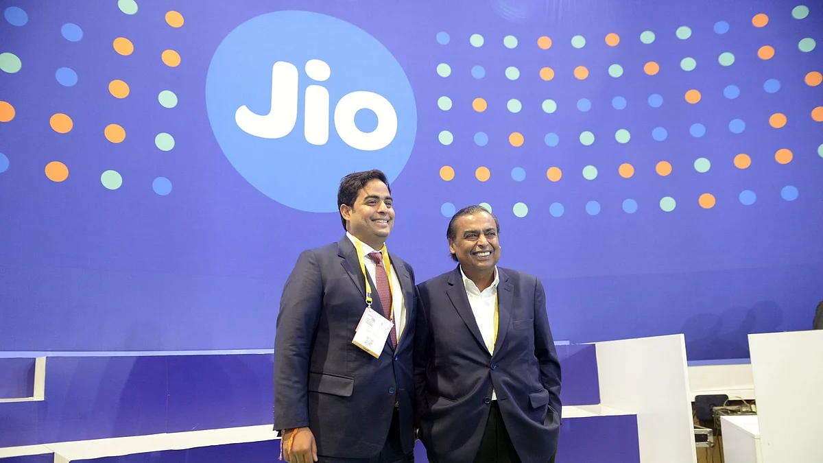 <div class="paragraphs"><p>Mukesh Ambani, chairman of Reliance Industries Ltd., right, with his son Akash Ambani, chairman of Reliance Jio Infocomm Ltd., visit a company's stall at India Mobile Congress 2022 in New Delhi, India.</p></div>