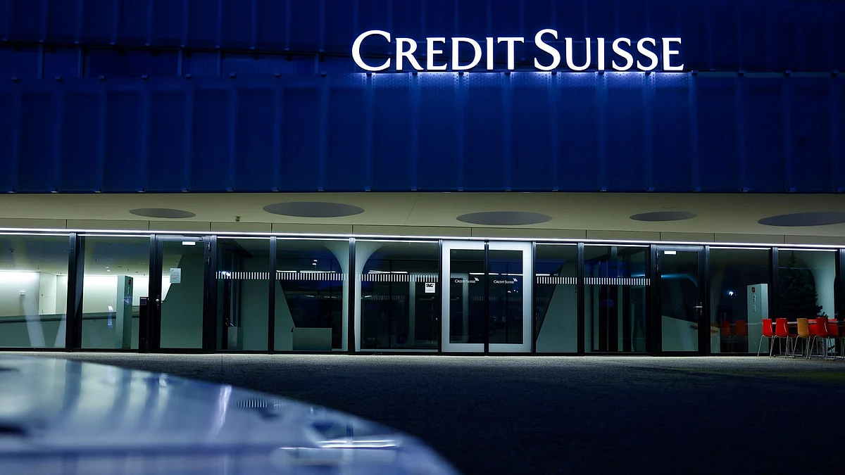 A Credit Suisse Group AG office building at night in the Muri district of Bern, Switzerland, on Sunday, Nov. 27, 2022. Credit Suisse clients pulled as much as 84 billion Swiss francs ($88.3 billion) of their money from the bank during the first few weeks of the quarter, underlining ongoing concerns over the bank’s restructuring efforts after years of scandals. Photographer: Stefan Wermuth/Bloomberg