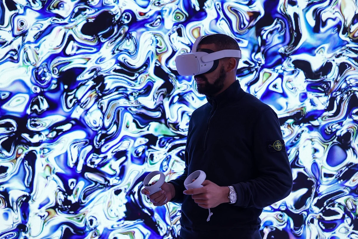 A Meta headset with hand controllers.