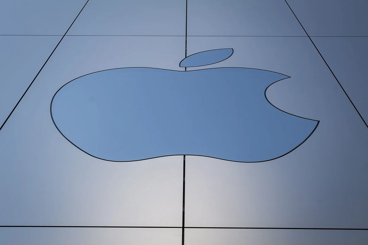 The Apple Inc. logo at a store in San Francisco, California, U.S., on Friday, Oct. 23, 2020. The iPhone 12 and iPhone 12 Pro went on sale in stores, but with individual shopping sessions replacing the famous lines and crowds around locations. Photographer: David Paul Morris/Bloomberg