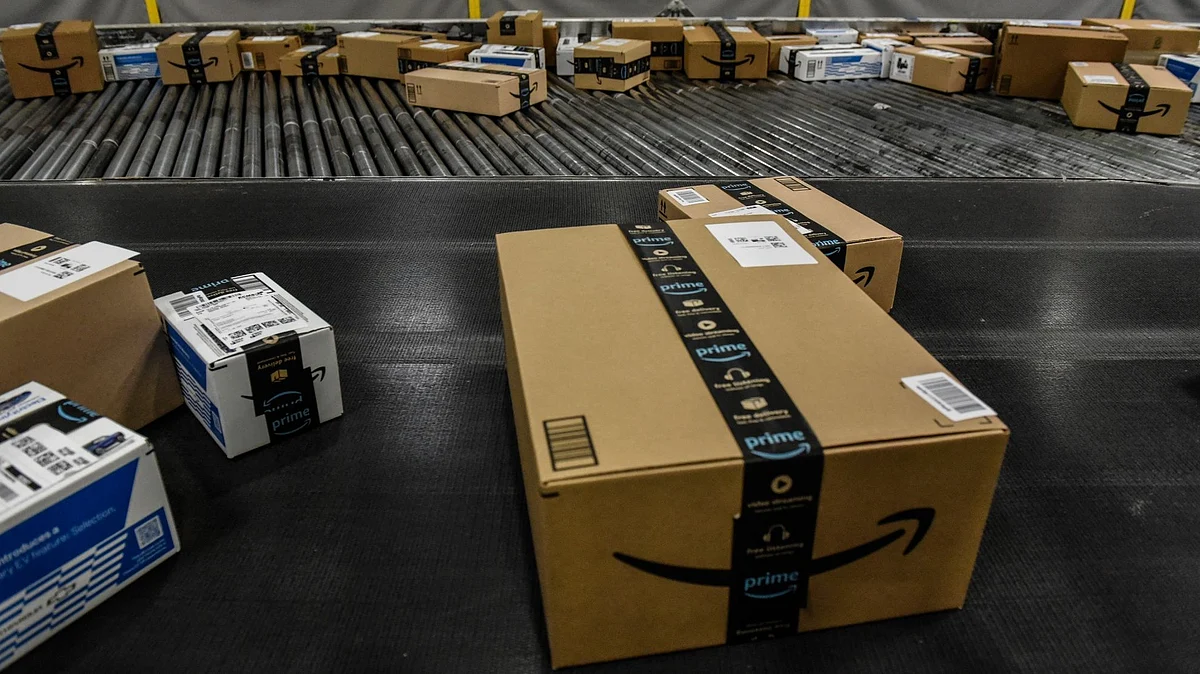 Packages move along a conveyor belt at an Amazon Fulfillment center on Cyber Monday in Robbinsville, New Jersey, US, on Monday, Nov. 28, 2022. US retailers showed modest sales growth over Black Friday weekend, using deep discounts to lure shoppers stung by the rising cost of living. Cyber Monday results will paint a fuller picture of demand this holiday season, analysts say. Photographer: Stephanie Keith/Bloomberg