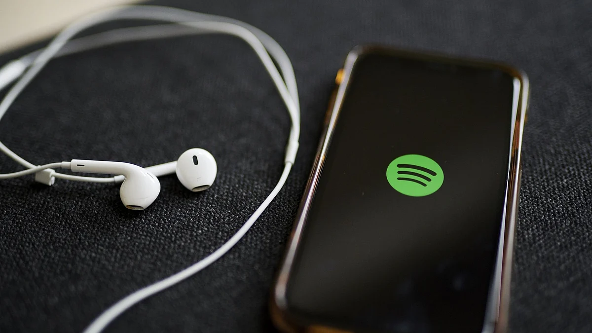 The logo for Spotify on a smartphone. Photographer: Gabby Jones/Bloomberg