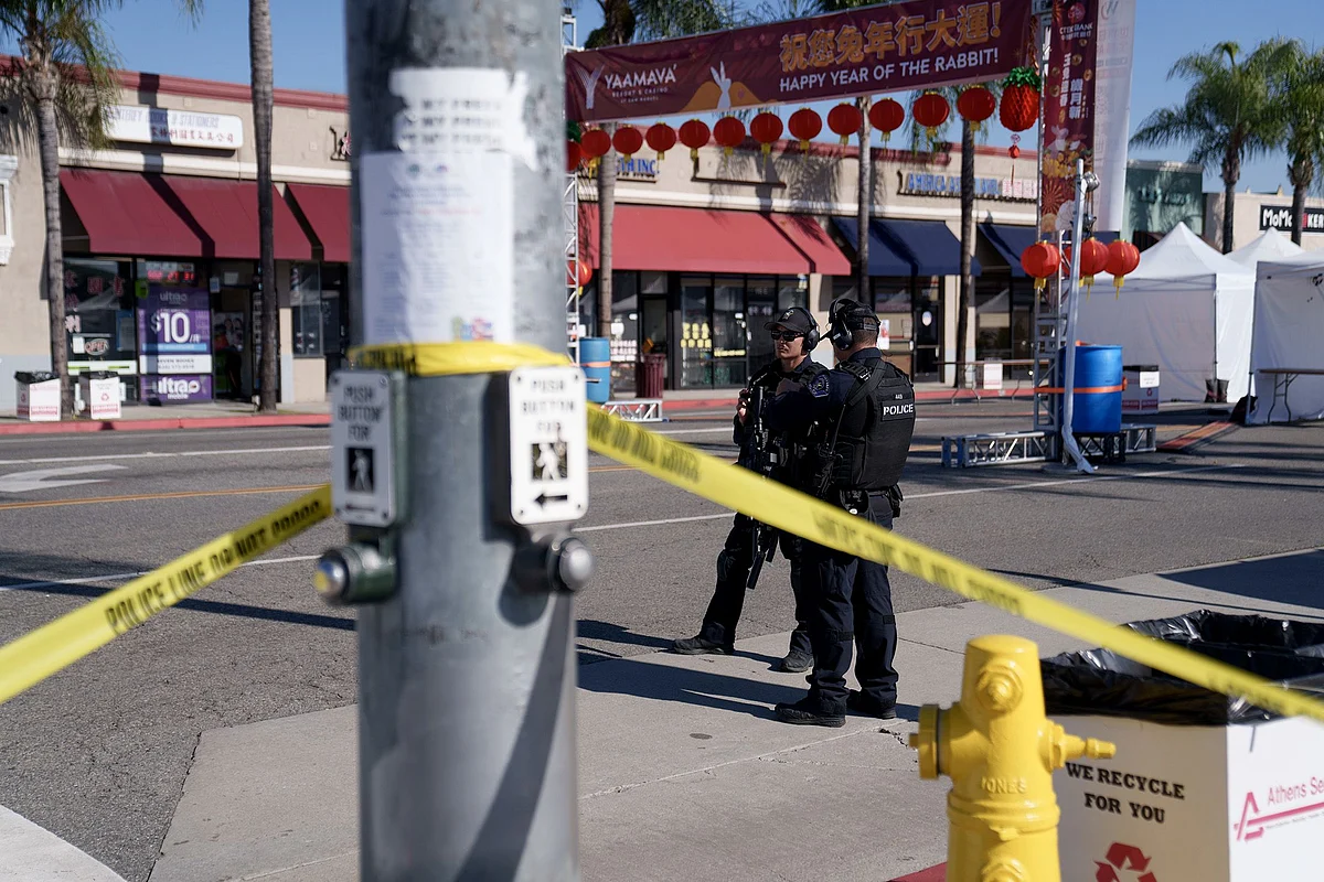 Police officers stand guard near the scene of a deadly shooting on in Monterey Park, California, on Jan. 22.