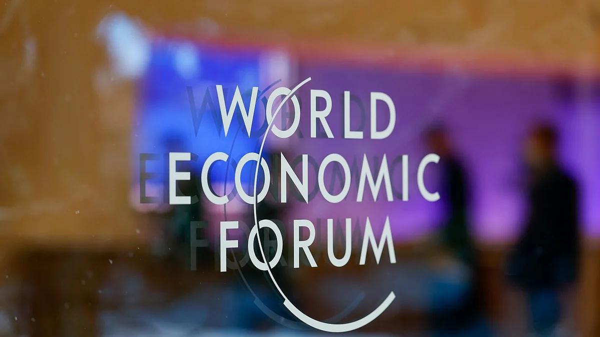 The logo the World Economic Forum (WEF) on a window inside the Congress Centre ahead of the World Economic Forum (WEF) in Davos, Switzerland, on Sunday, Jan. 15, 2023. The annual Davos gathering of political leaders, top executives and celebrities runs from January 16 to 20. Photographer: Stefan Wermuth/Bloomberg