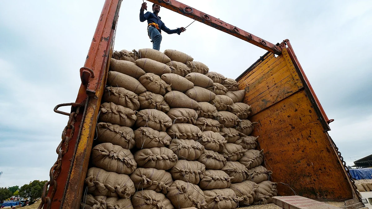 Bags of paddy rice loaded on a truck at the grain market in Ambala, India, on Sunday, Oct. 9, 2022. Rice is a staple food for about half of the world’s population, with Asia producing and consuming about 90% of global supply.