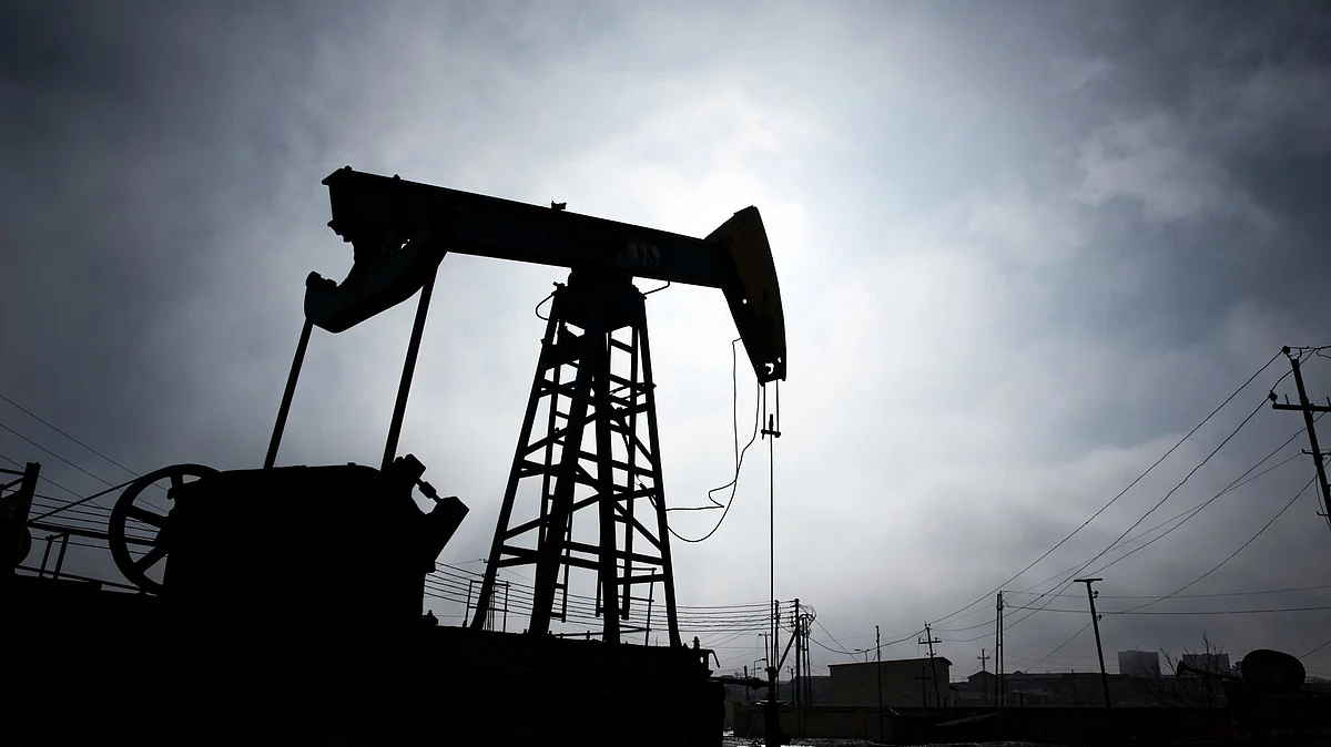 A pumpjack is silhouetted as it operates in Baku, Azerbaijan, on Sunday, March 18, 2018. Two years after descending into junk, Azerbaijan's shortest path to winning back its investment grade is by rebuilding the stash of petrodollars it raided during a recession and a banking meltdown, according to Fitch Ratings. Photograph: Taylor Weidman/Bloomberg Photographer: Taylor Weidman/Bloomberg