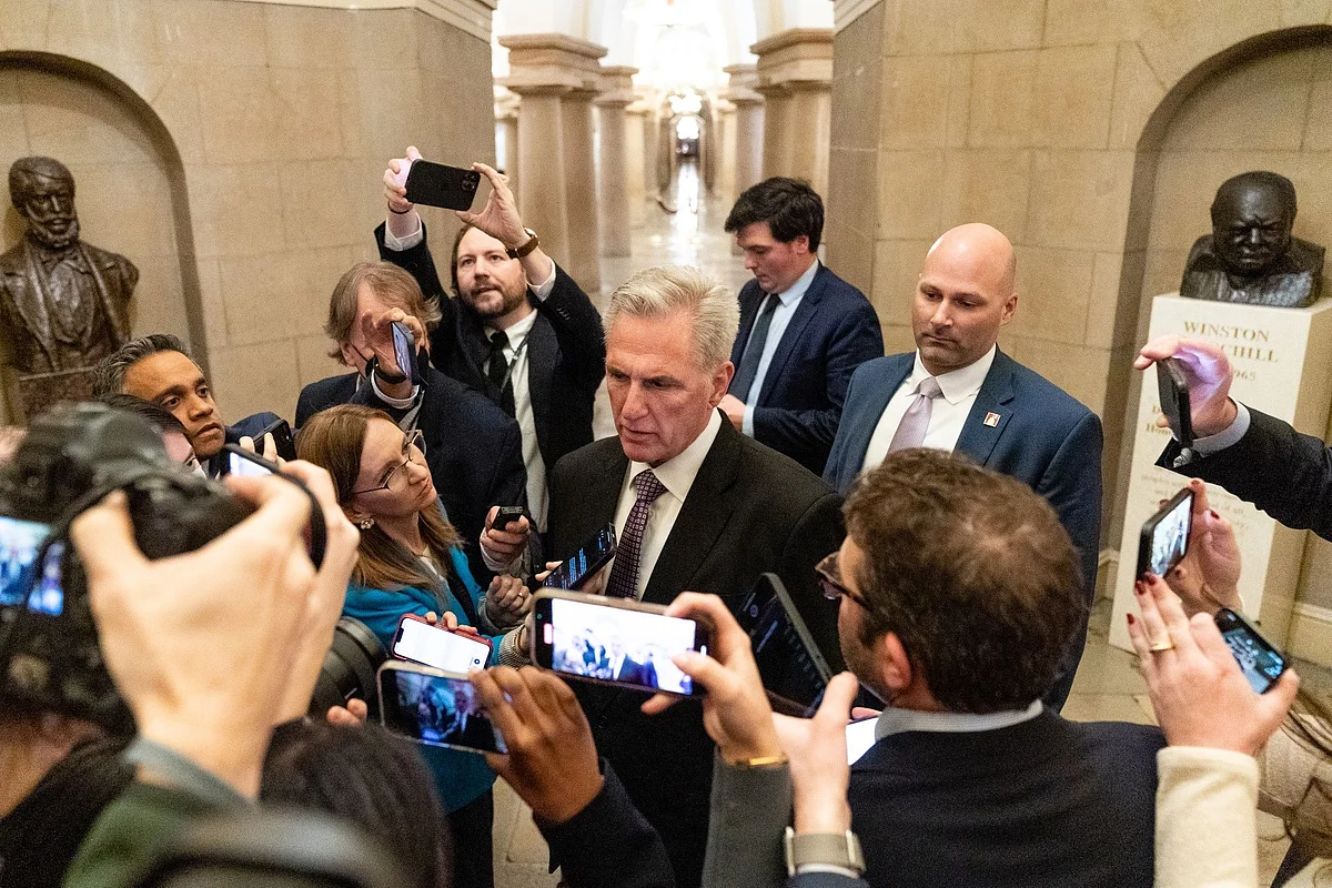 Representative Kevin McCarthy, a Republican from California, center, talks with members of the media in the House Chamber at the US Capitol in Washington, DC, US, on Wednesday, Jan. 4, 2023. The US House adjourned Wednesday night after Kevin McCarthy and GOP dissidents failed to reach a deal on the California Republican’s languishing bid to become speaker.