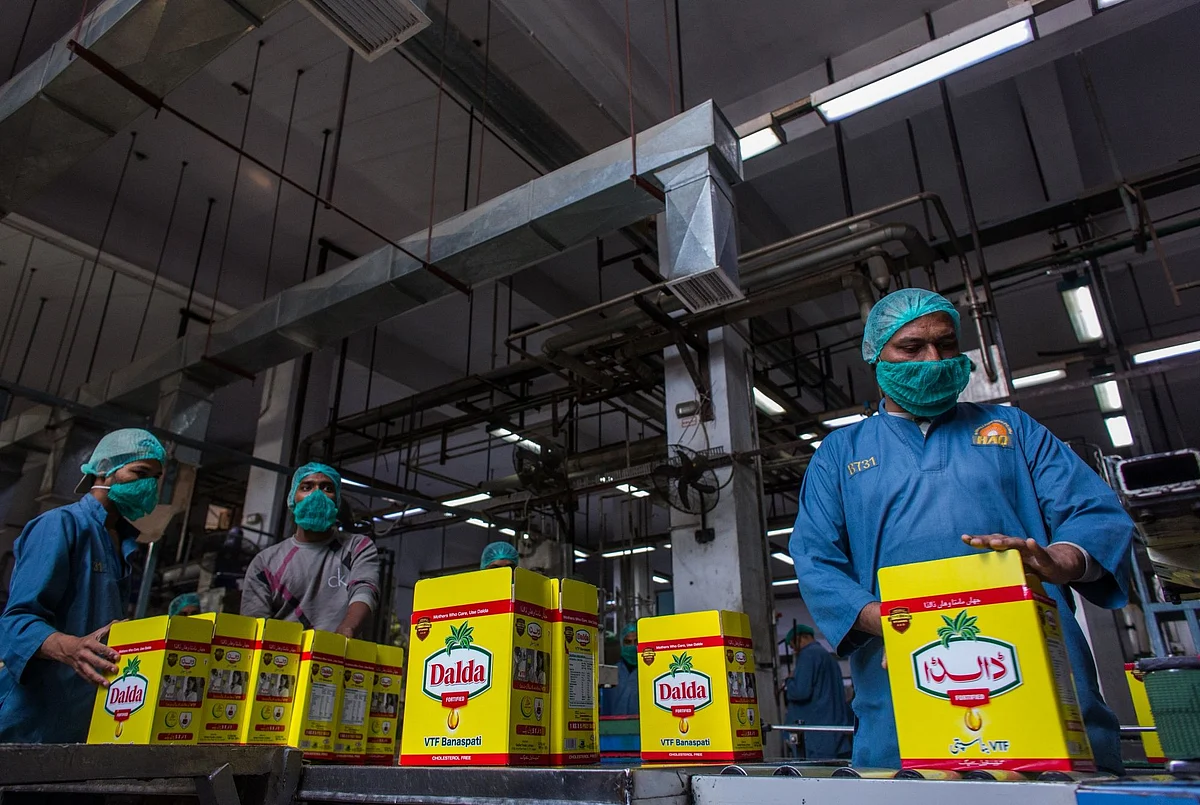 Employees at the Dalda Foods Ltd. factory in Karachi, Jan. 20.