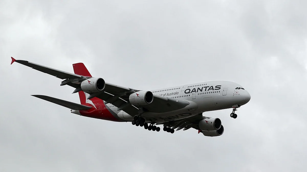 An Airbus SE A380 aircraft operated by Qantas Airways Ltd. approaches to land at Sydney Airport in Sydney, Australia, on Thursday, Feb. 21, 2019. Qantas' international business is bearing the brunt of higher fuel costs, which are shredding the division's profit margin. Photographer: Bloomberg/Bloomberg