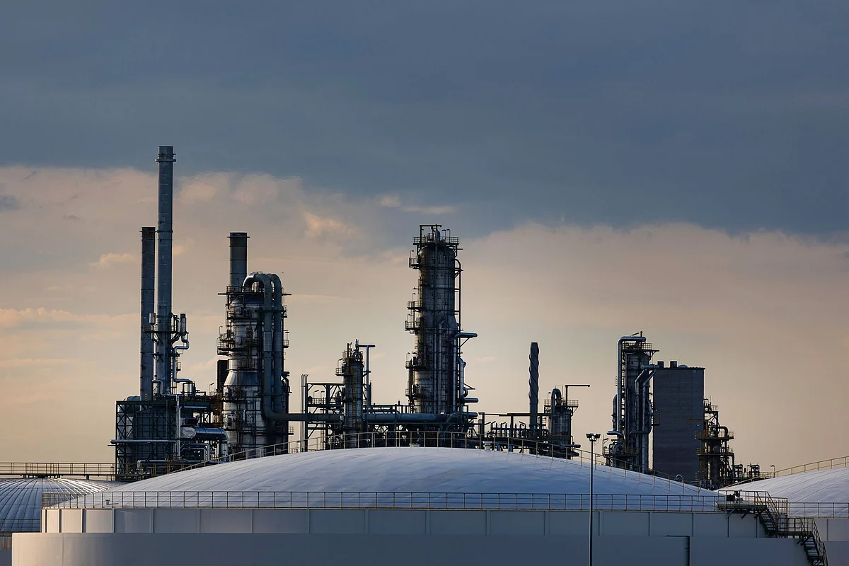 Storage tanks at the TotalEnergies SE Leuna oil refinery in Leuna, Germany, on Tuesday, June 7, 2022. TotalEnergies' 240,000 barrels per day Leuna refinery is set to cease importing Russian crude oil via the Druzhba pipeline some time later this year. Photographer: Krisztian Bocsi/Bloomberg