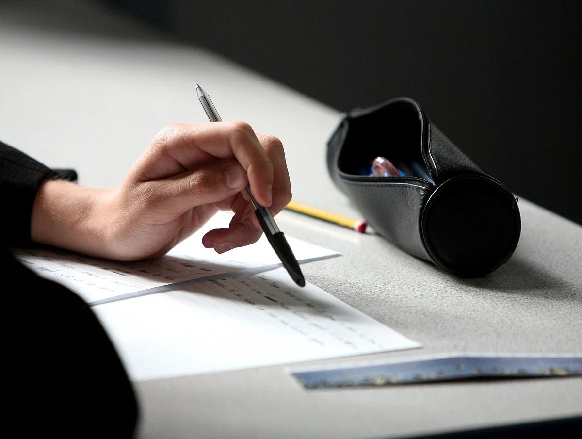 A GCSE student takes an exam at Maidstone Grammar School, in Kent, U.K., on Wednesday, June 4, 2008. Maths exam standards have declined significantly over the past 50 years, with generations of teenagers facing undemanding questions that do not test their independent reasoning abilities, a report by the centre-right thinktank Reform said yesterday. Photographer: Chris Ratcliffe/Bloomberg News